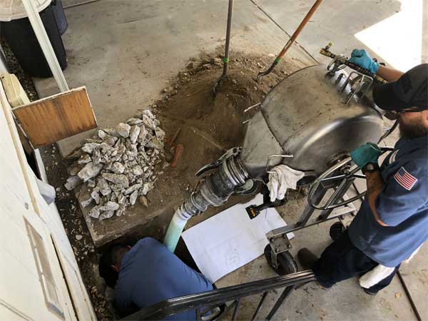 Man fixing pipe